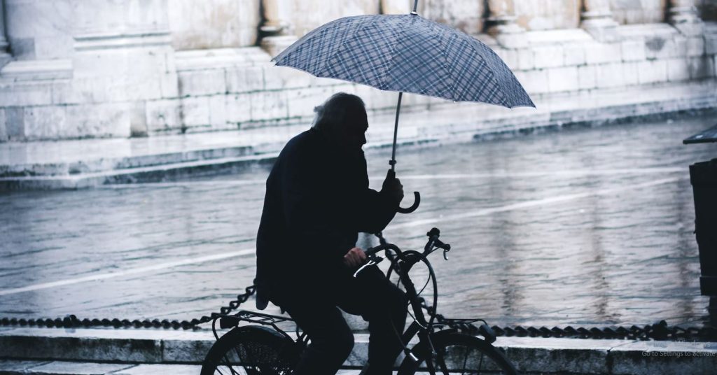 Cycling With a Umbrella